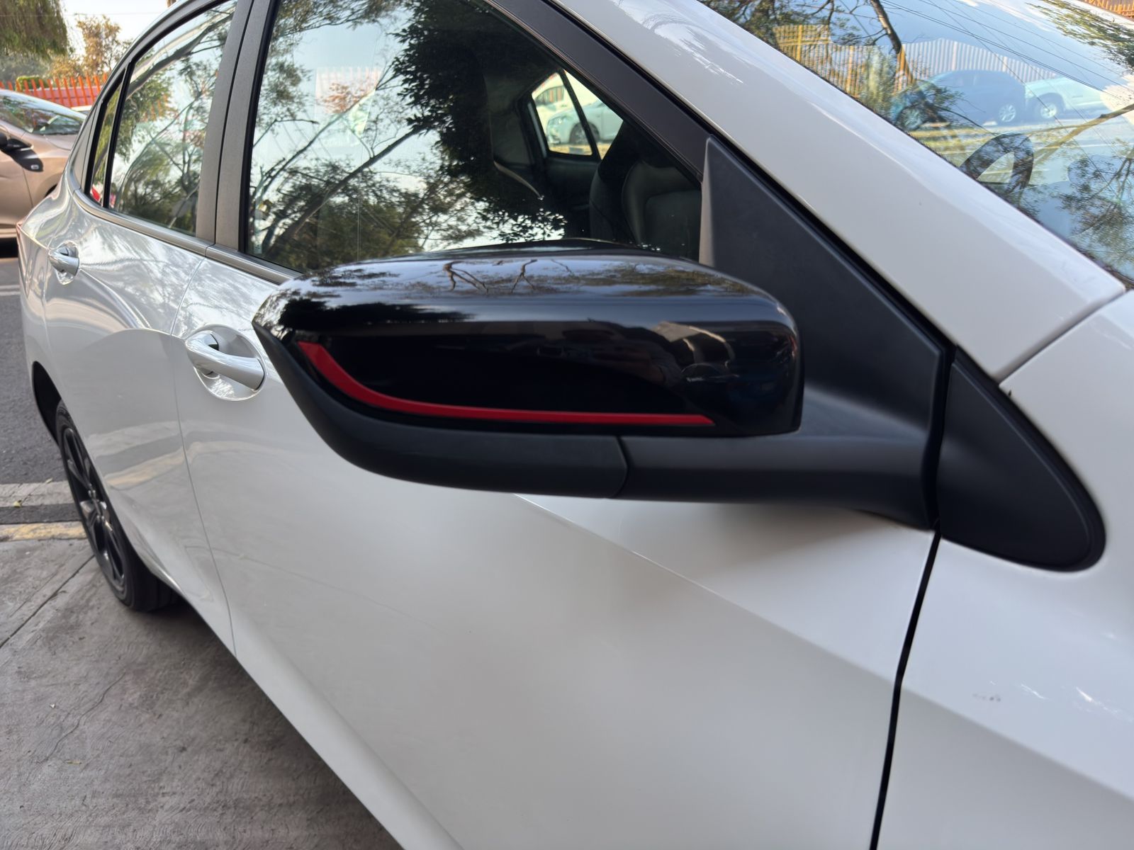 2023 Chevrolet ONIX 4 PTS PREMIER RED LINE 10T TA AAC AUT BA VE F LED QC RA-16